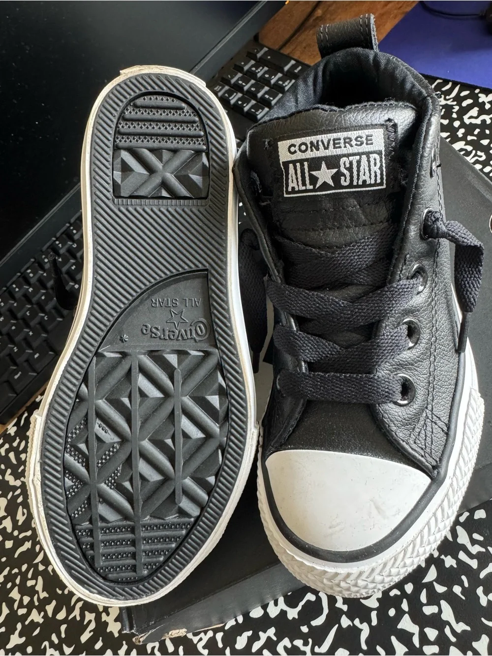 Converse Black and White Leather High Top Sneakers